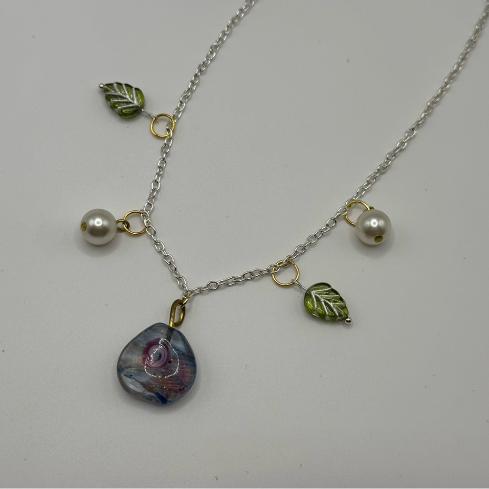 Elegant Silver Necklace with Green Leaf and Pearl Accents
